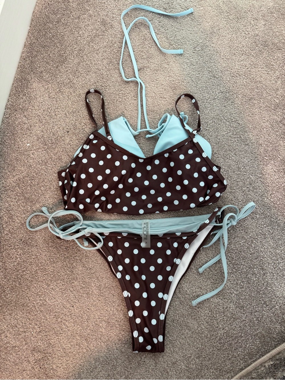 New, never worn three piece bikini set